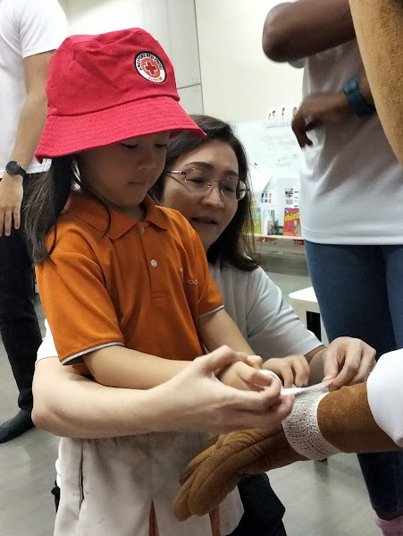 Learning the basic of first Aid with Singapore Red Cross — photo 3