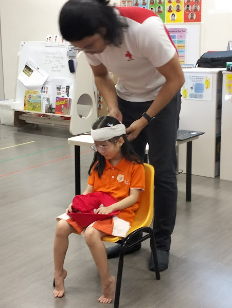 Learning the basic of first Aid with Singapore Red Cross — photo 4