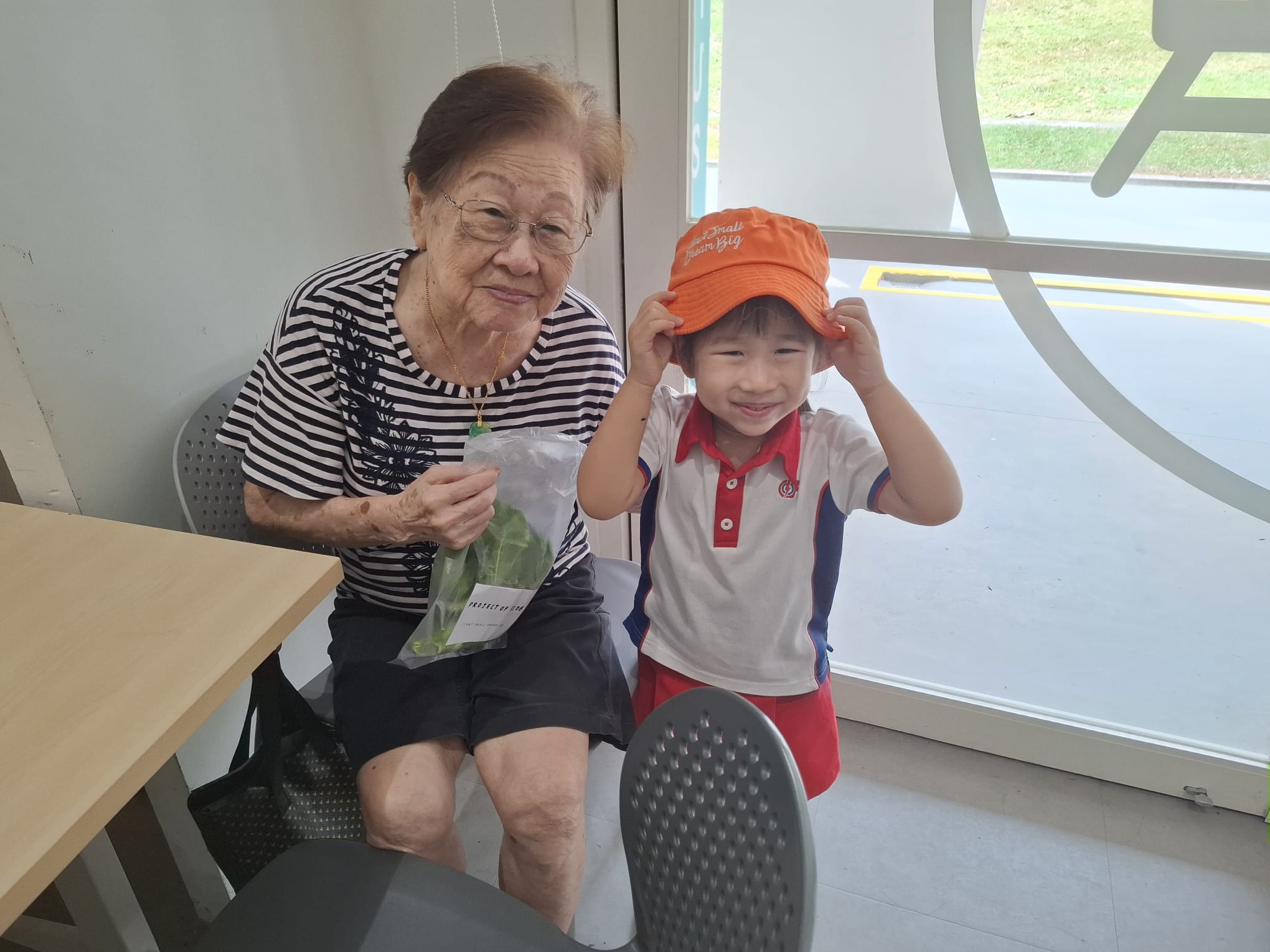 The Early Years children growing and caring for their own Xiao Bai Cai (小白菜) and share their product with the Elderly at The "Monfort Senior Care." — photo 12