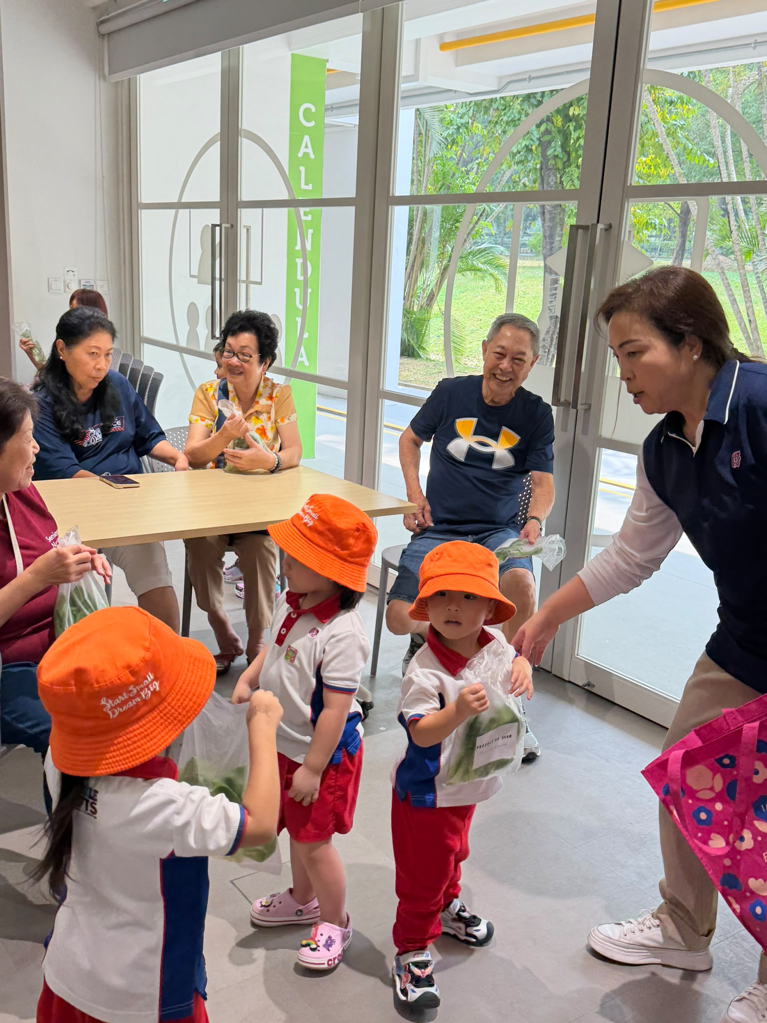The Early Years children growing and caring for their own Xiao Bai Cai (小白菜) and share their product with the Elderly at The "Monfort Senior Care." — photo 14