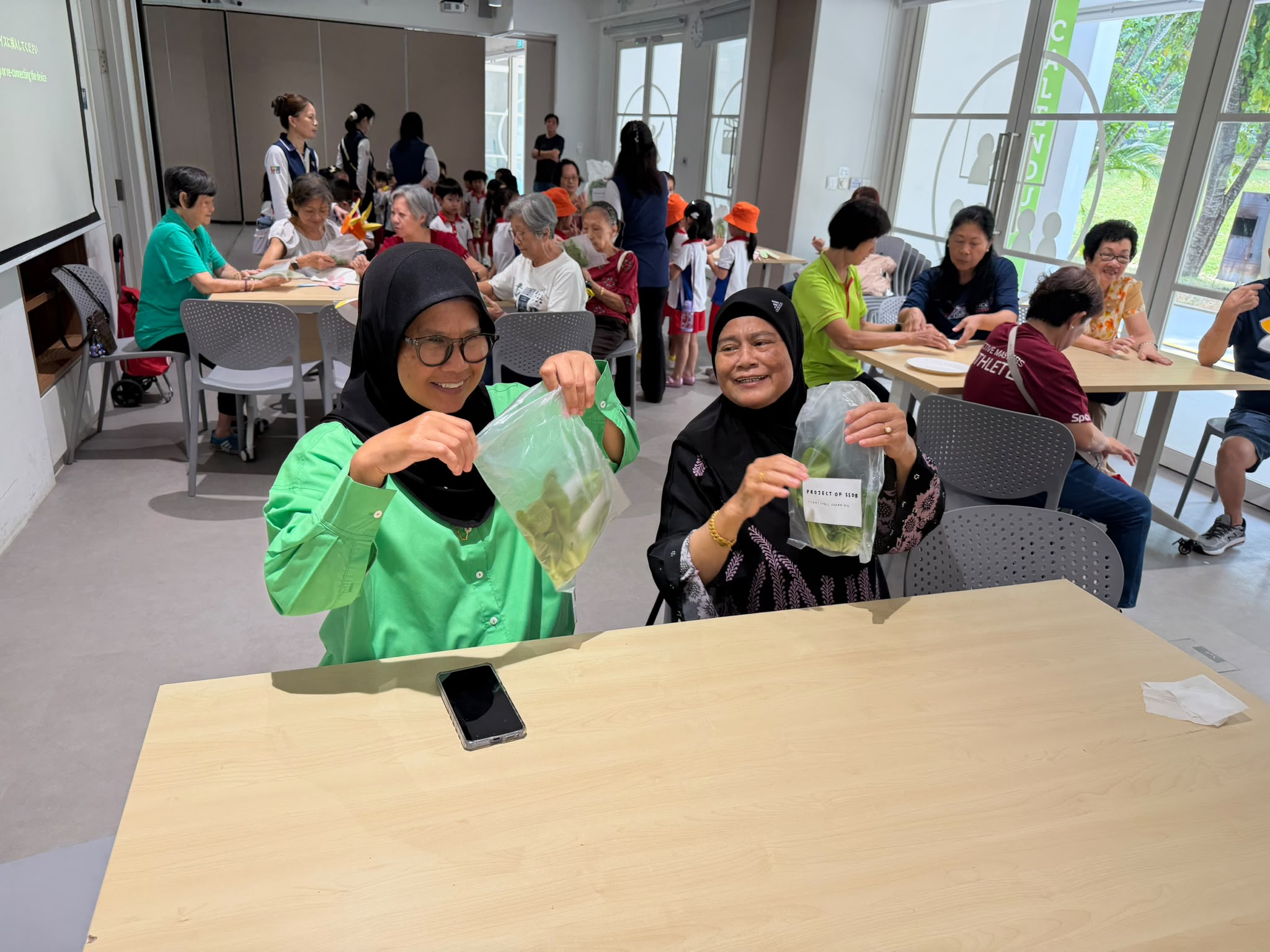 The Early Years children growing and caring for their own Xiao Bai Cai (小白菜) and share their product with the Elderly at The "Monfort Senior Care." — photo 15