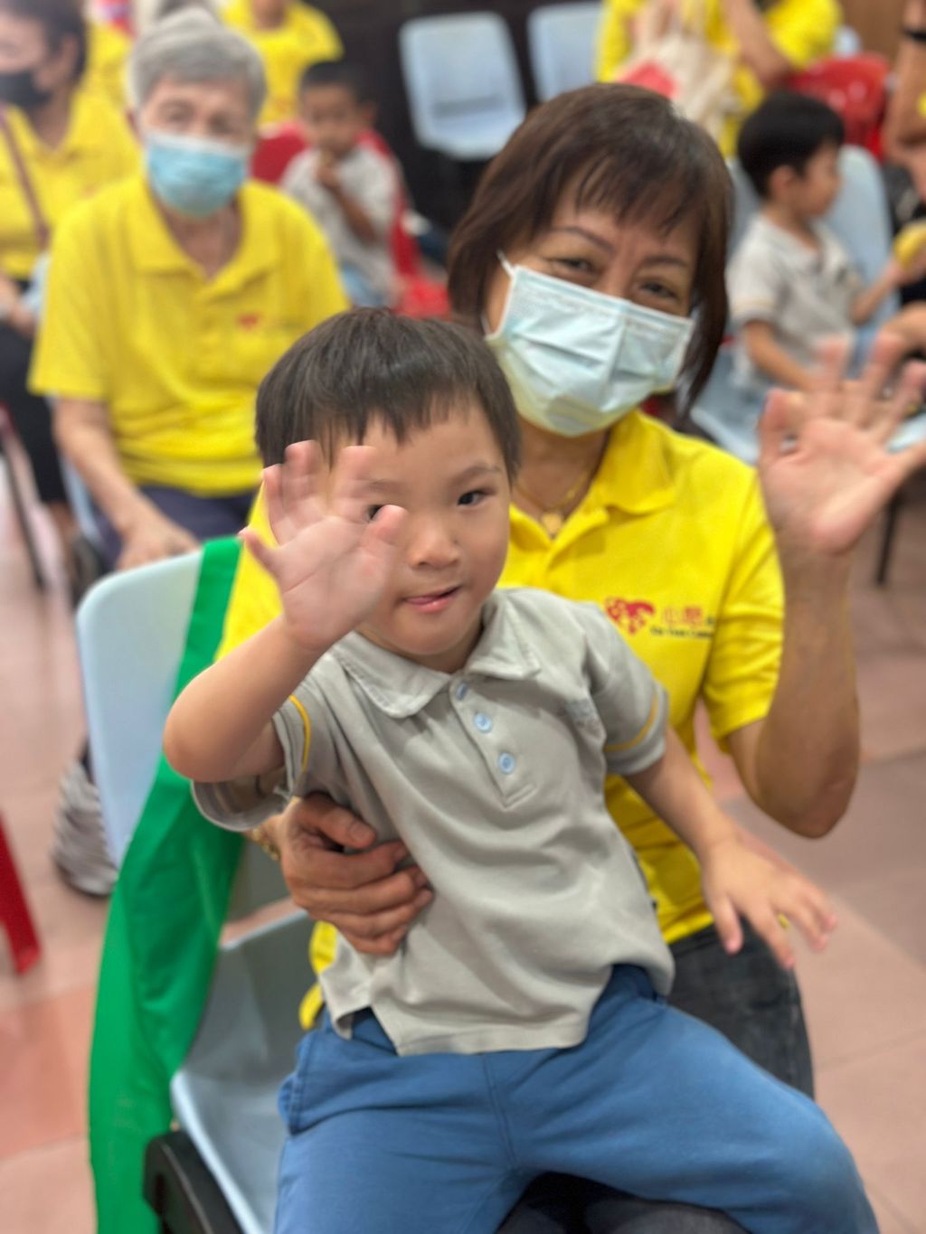 Doing exercises and having snacks together at Xin Yuan Community Care — photo 4