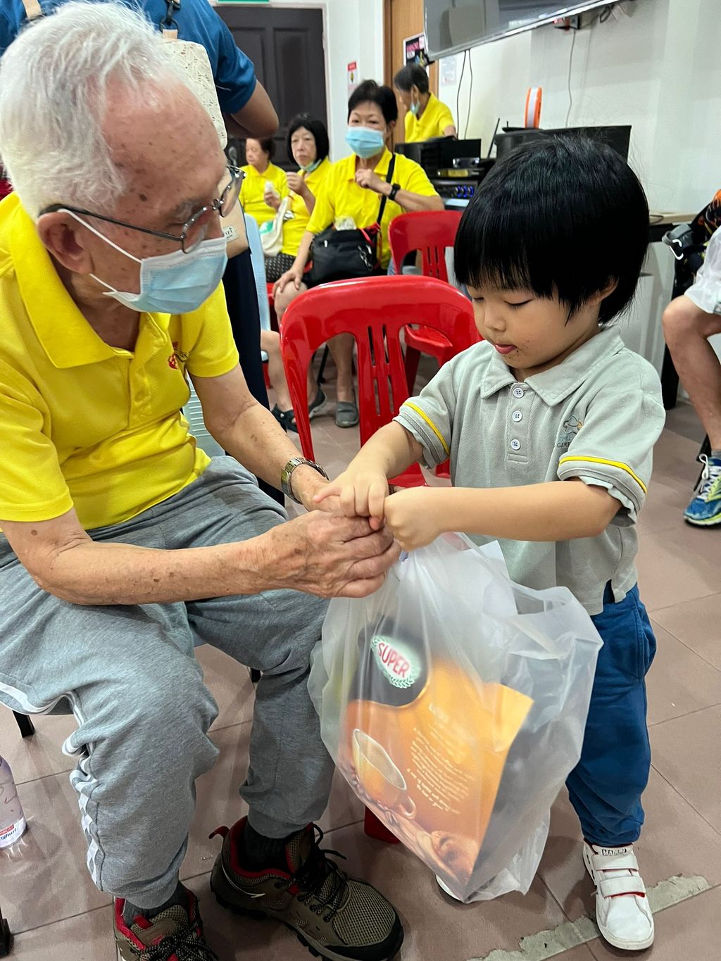Doing exercises and having snacks together at Xin Yuan Community Care — photo 10