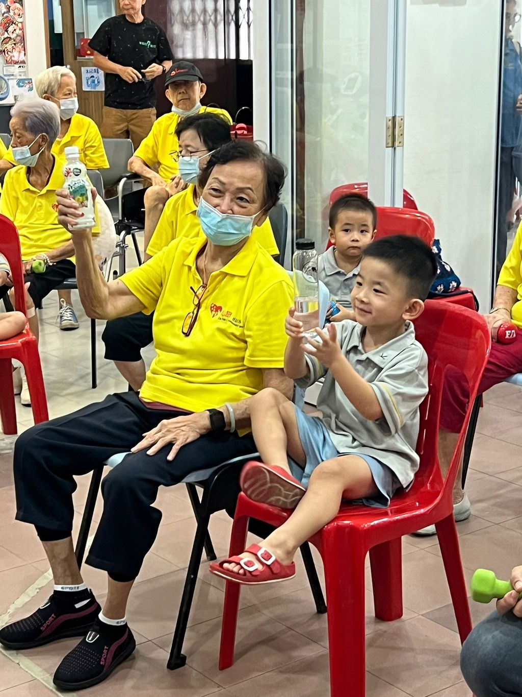 Doing exercises and having snacks together at Xin Yuan Community Care — photo 11