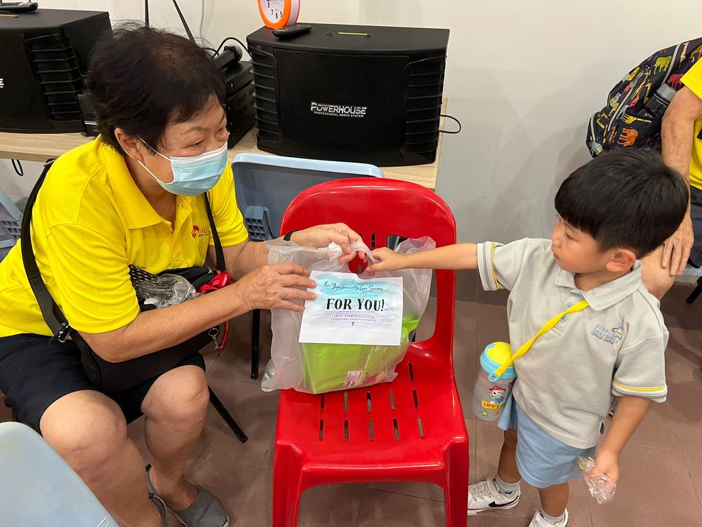 Doing exercises and having snacks together at Xin Yuan Community Care — photo 12