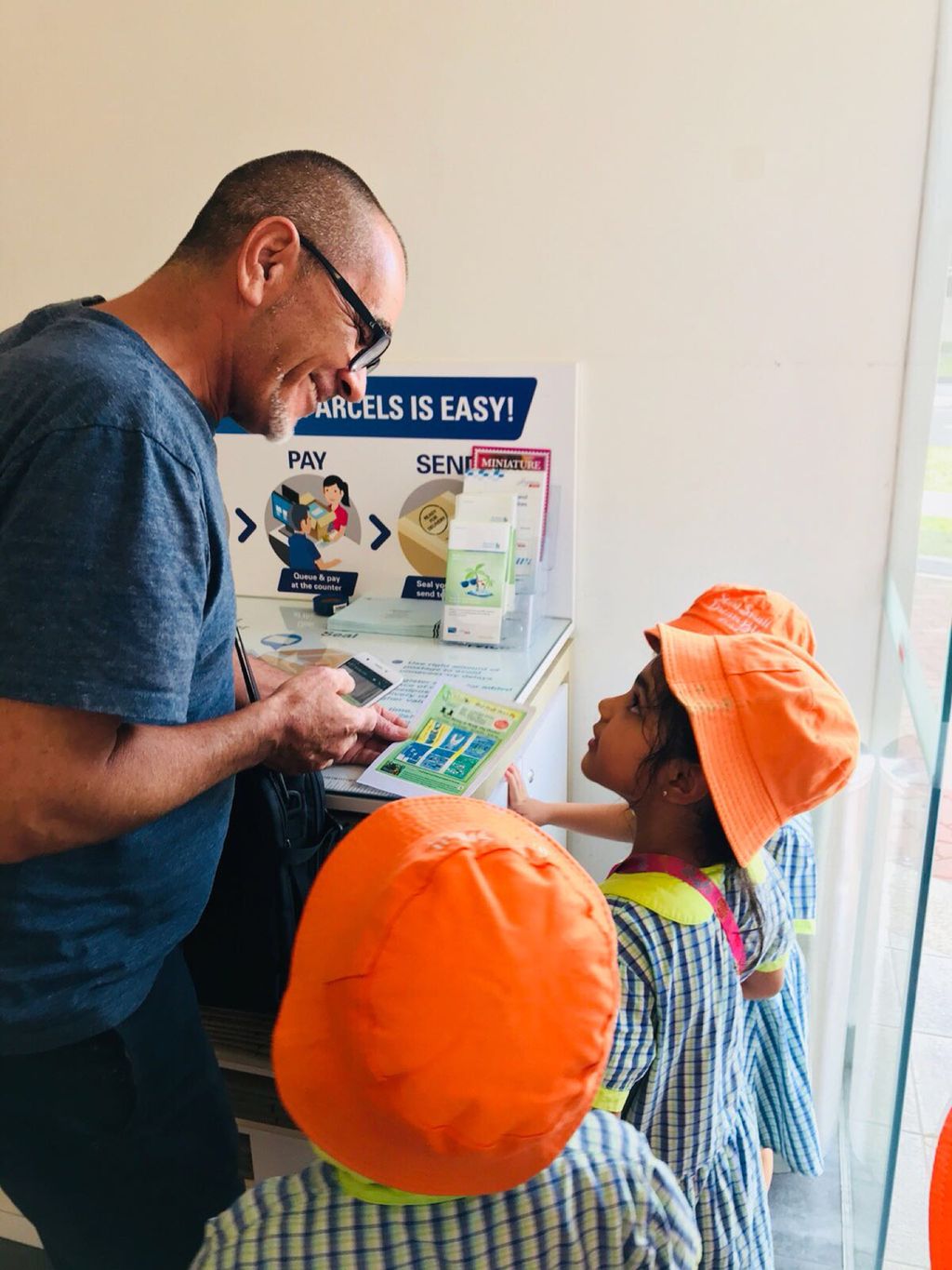 Superheroes Caring For The Environment: Distributing Posters to the Community — photo 5