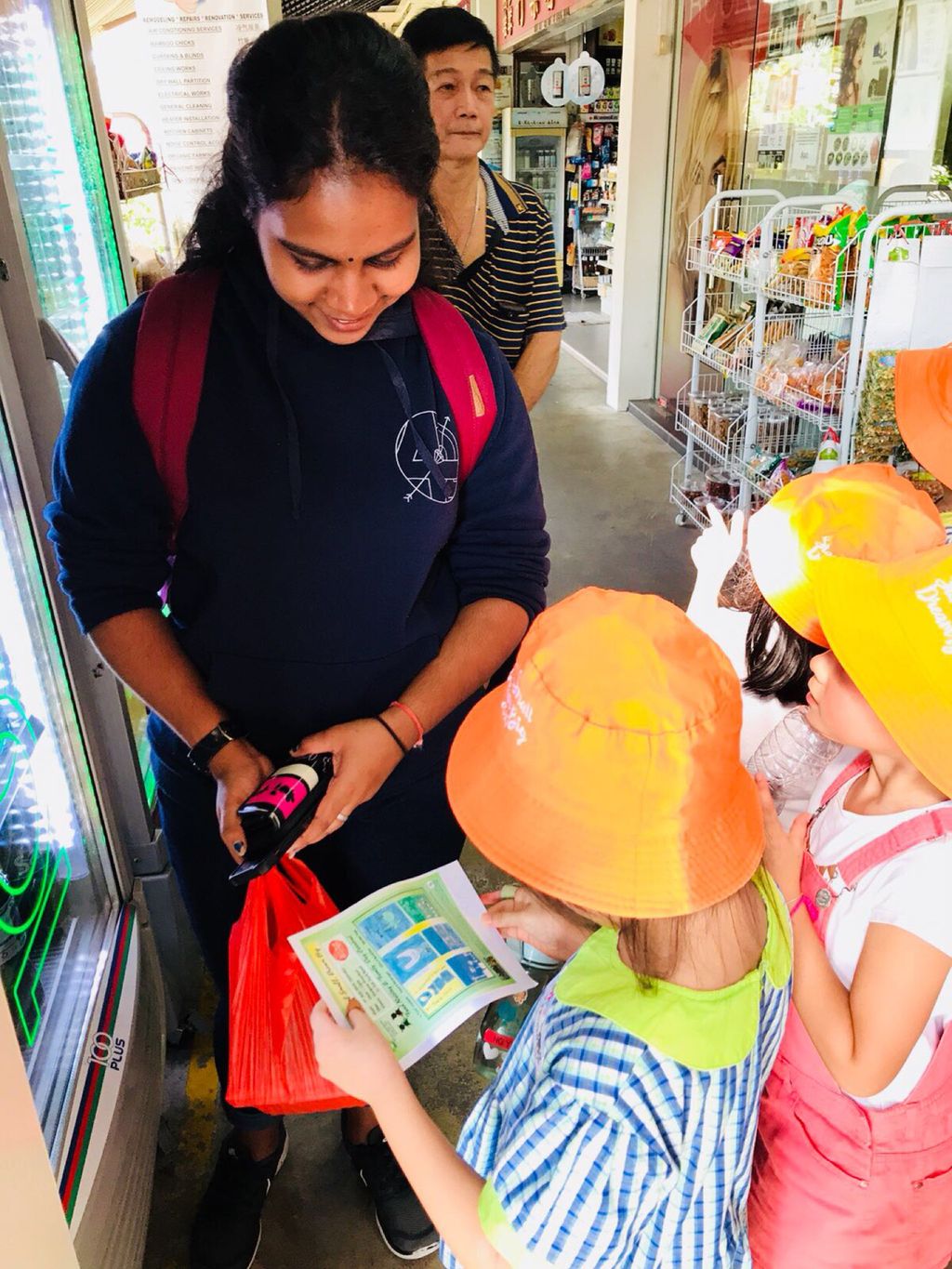 Superheroes Caring For The Environment: Distributing Posters to the Community — photo 6