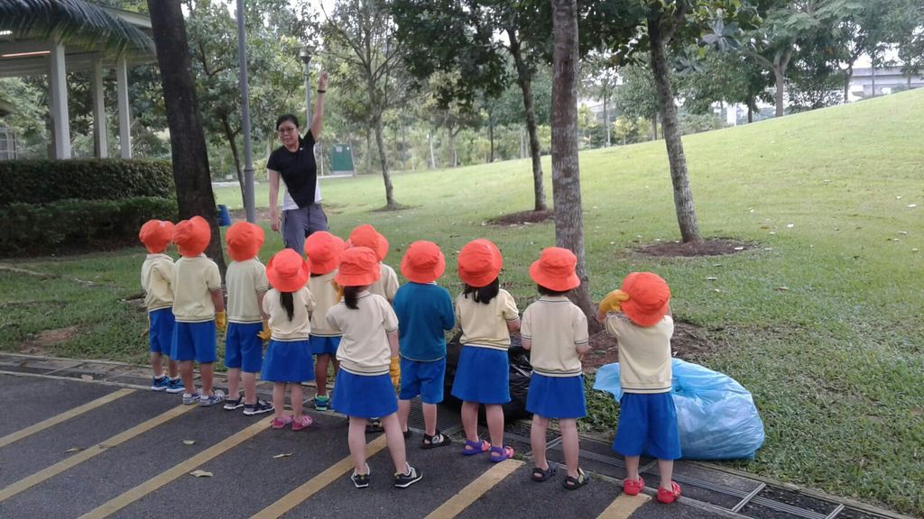 NurtureStars Punggol's Nursery students nurturing Punggol Waterway Park through mulching & weeding! — photo 1