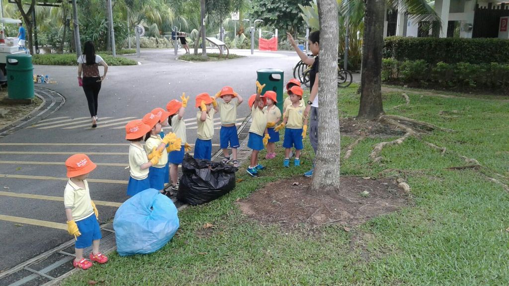 NurtureStars Punggol's Nursery students nurturing Punggol Waterway Park through mulching & weeding! — photo 2