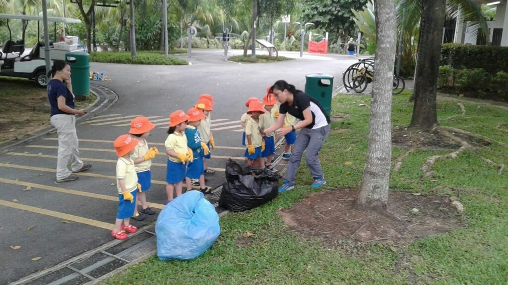 NurtureStars Punggol's Nursery students nurturing Punggol Waterway Park through mulching & weeding! — photo 3