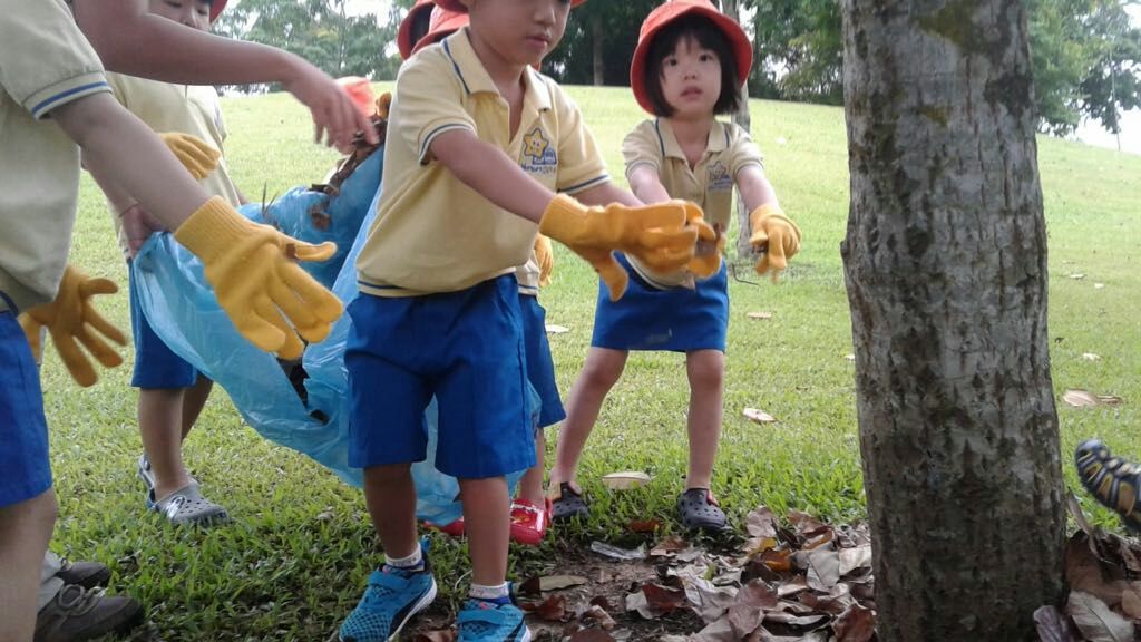 NurtureStars Punggol's Nursery students nurturing Punggol Waterway Park through mulching & weeding! — photo 2
