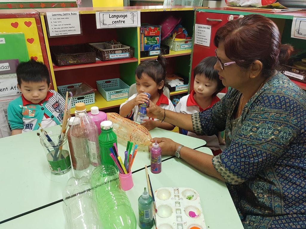 Upcycling our water bottles through planting — photo 14
