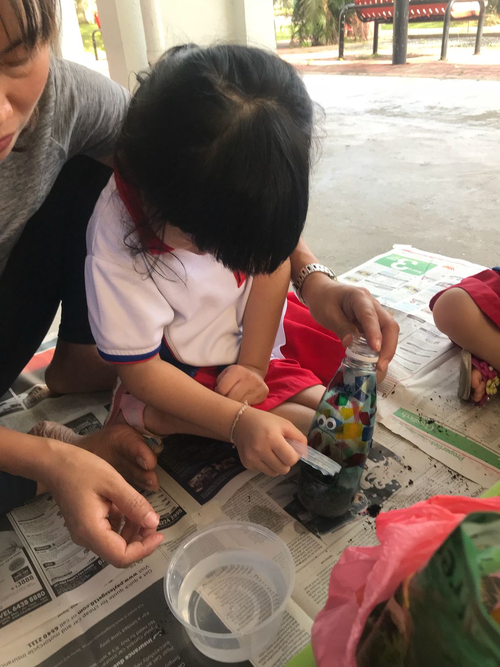 Upcycling our water bottles through planting — photo 9