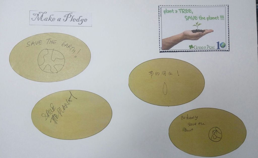 Let's pledge in saving our Environment! - children and parents penned down their pledges in the SSDB floor book . — photo 2
