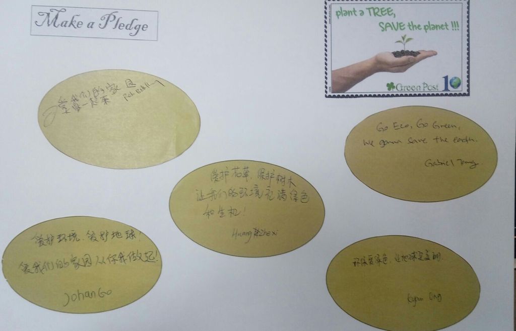 Let's pledge in saving our Environment! - children and parents penned down their pledges in the SSDB floor book . — photo 3