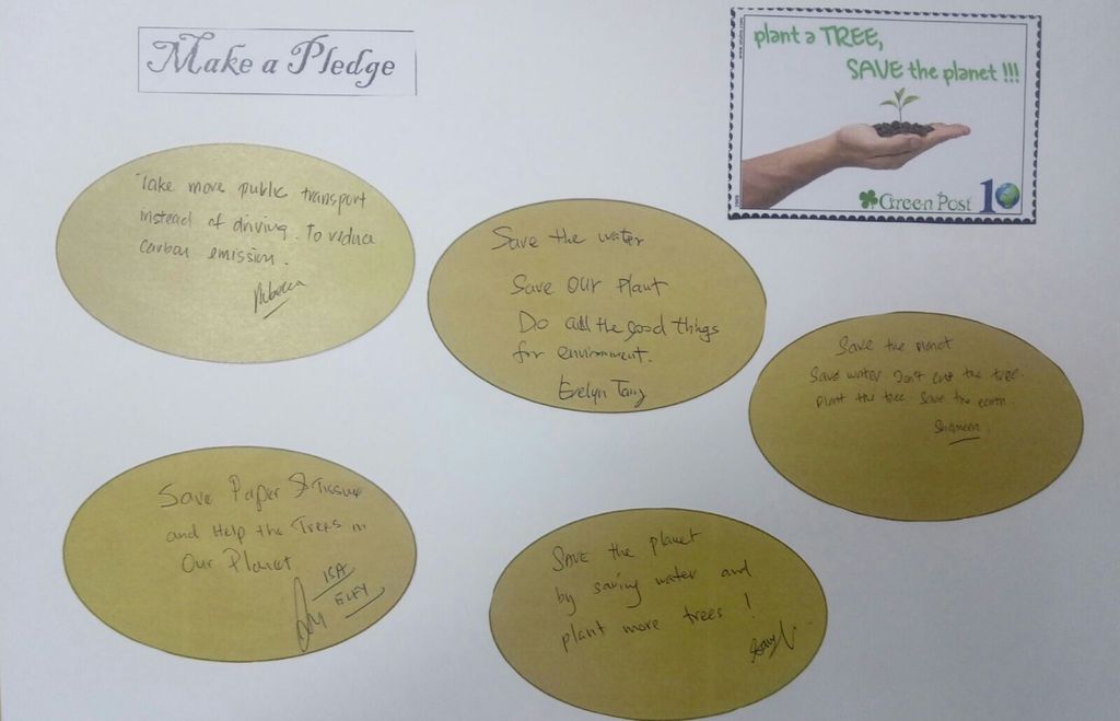 Let's pledge in saving our Environment! - children and parents penned down their pledges in the SSDB floor book . — photo 4