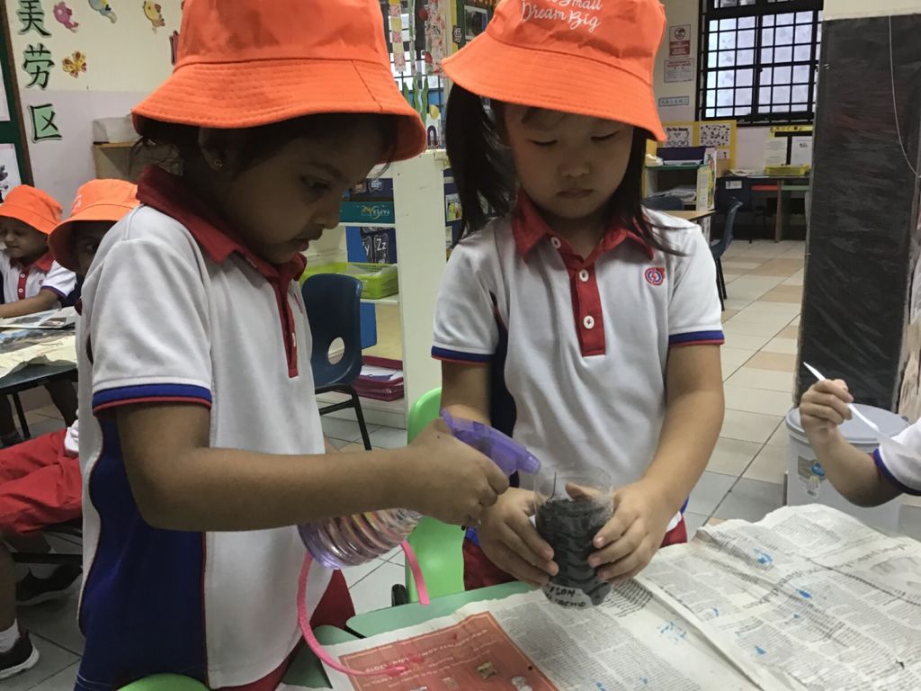 Little Hands Turn Litters into Bloomers — photo 2