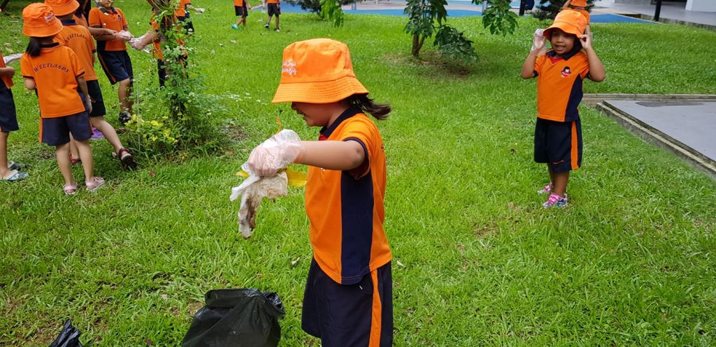 Picking up litter for our environment.