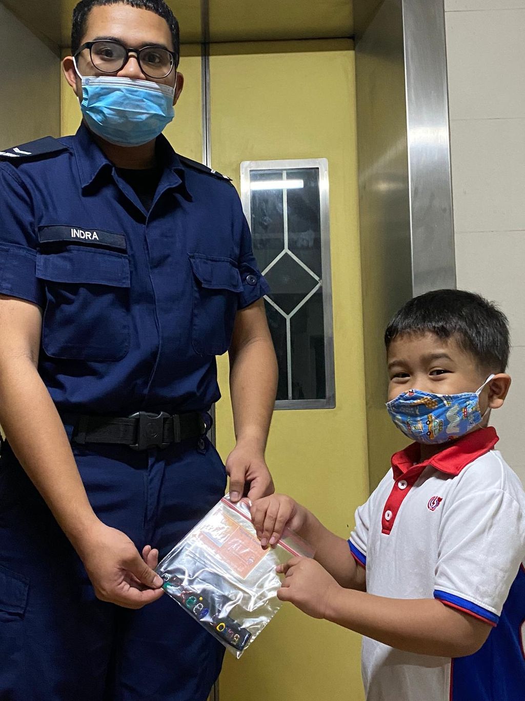 'CARING FOR THE COMMUNITY' Mass distribution of Mask Extender @ Blk. 443 — photo 22