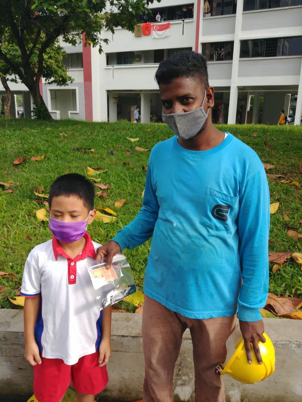 'CARING FOR THE COMMUNITY' Mass distribution of Mask Extender @ Blk. 443 — photo 23