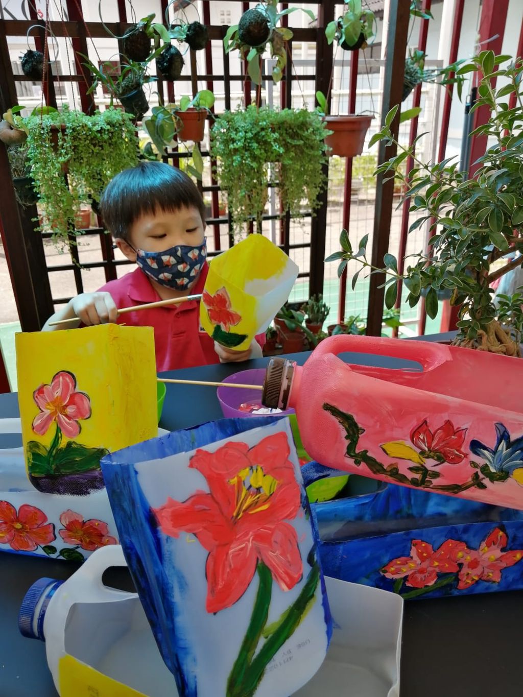 Recycled jugs turned flower pots — photo 2
