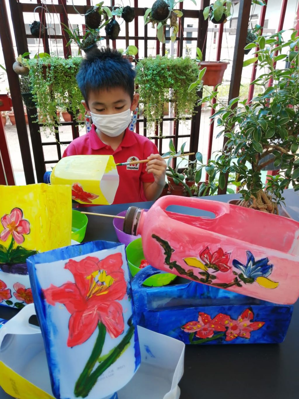 Recycled jugs turned flower pots — photo 3